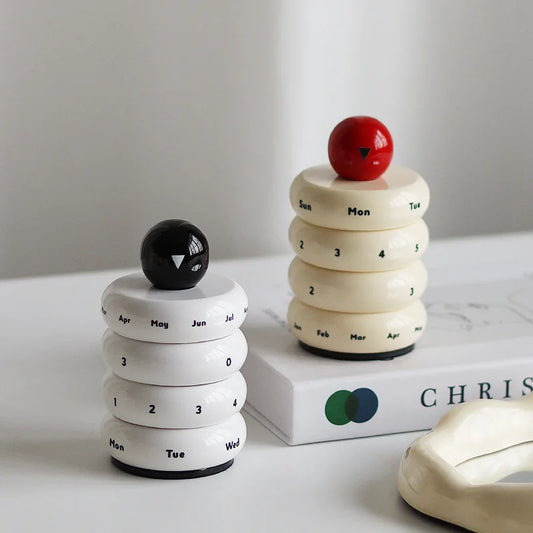 Calendário giratório de mesa
